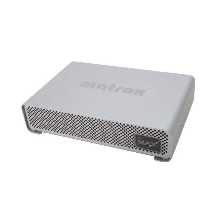 Gray Matrox MXO2 MAX desktop I/O device shown at an angle, displaying the perforated metal front panel and branding.