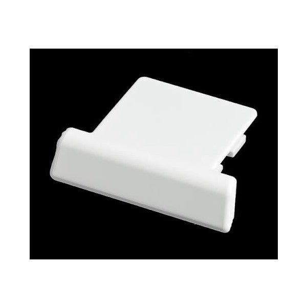 White plastic multi accessory port cover shown at an isometric angle against a black background, displaying its L-shaped design with flat and curved surfaces.