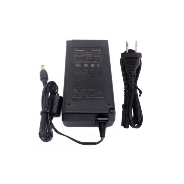Canon CG-CP200 charger with power adapter, DC cable, and AC power cord displayed against white background.