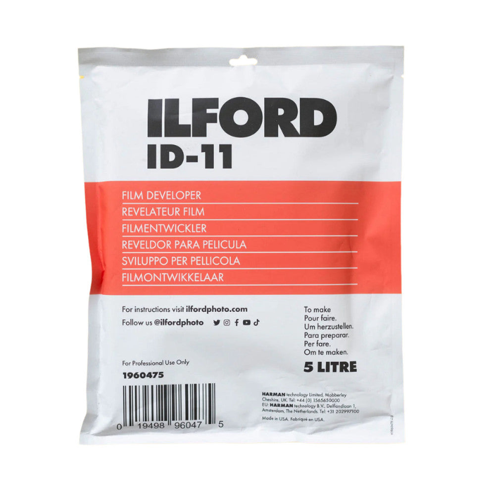 Front of Ilford ID-11 5 Litre film developer pouch with white and red label, barcode, and multilingual text visible.