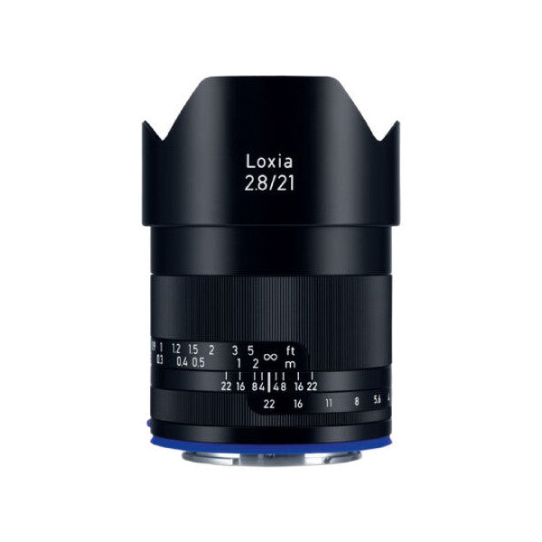 Front view of black Zeiss Loxia 28mm f/2.8 lens with focus ring and aperture markings visible, showing blue Sony E-mount base.