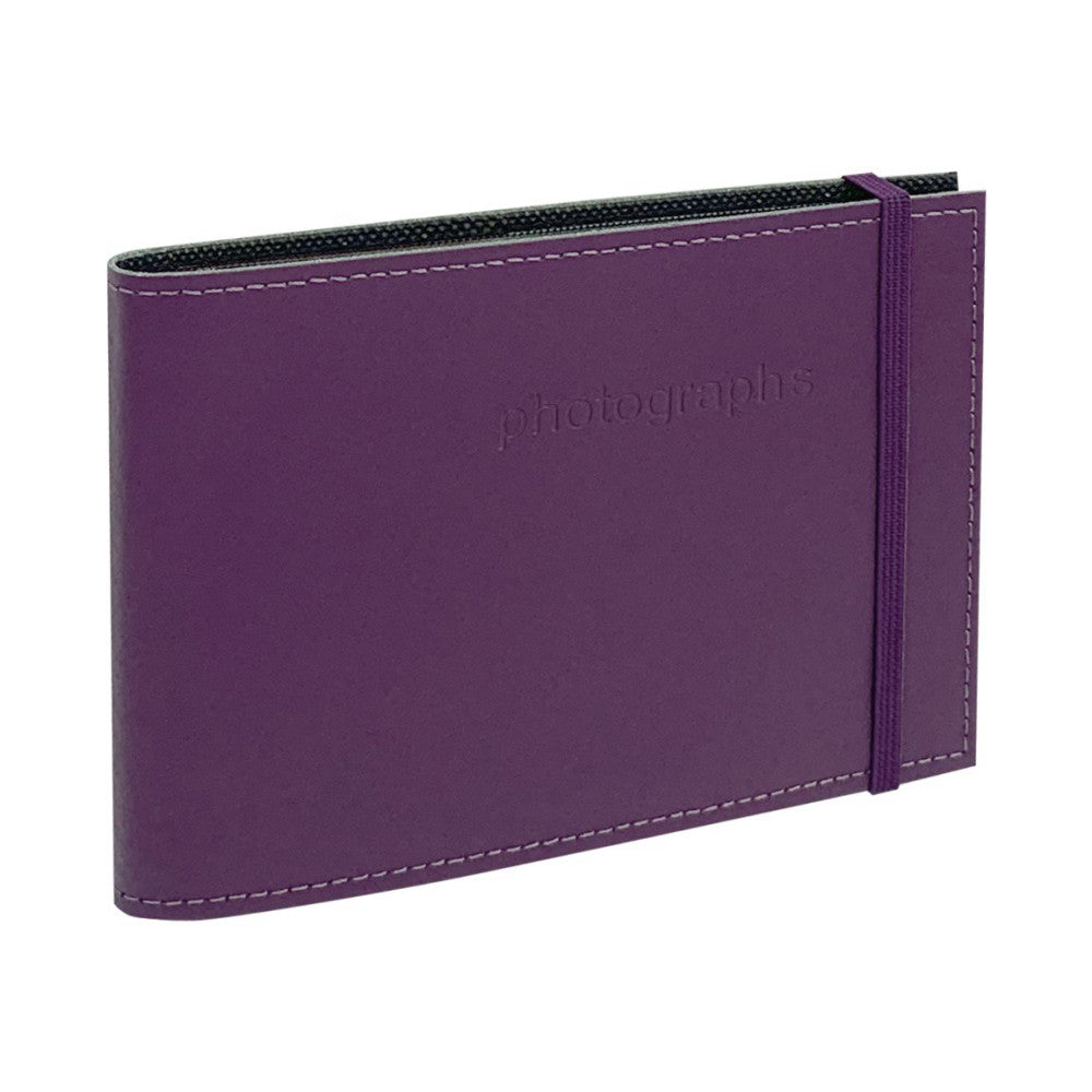 Three-quarter view of a purple leather photo album with white stitching, elastic closure band, and black textured interior visible at the spine.