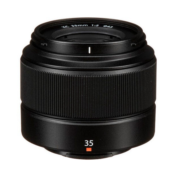 Front view of black Fujifilm XC 35mm f/2 lens showing barrel, focus ring, and red "35" designation mark.