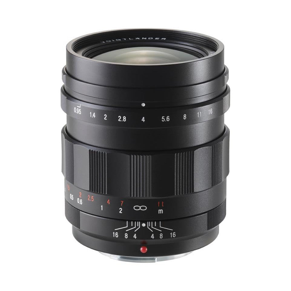Black Voigtlander 25mm f/0.95 manual focus lens shown from front three-quarter angle against white background, displaying aperture and focus rings.
