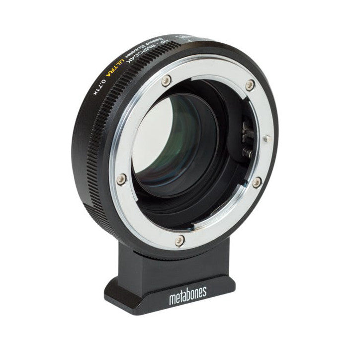 Metabones Speed Booster Ultra adapter shown from the side angle, displaying the lens mount interface with white metal ring and black barrel with gold text markings.