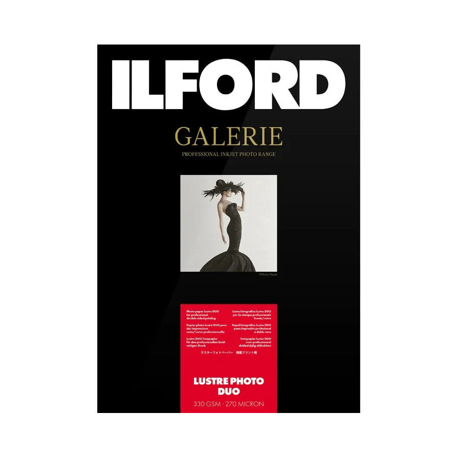 Front packaging of Ilford Galerie Lustre Photo Duo paper showing product name, artistic black and white photograph sample, and red specification label at bottom.