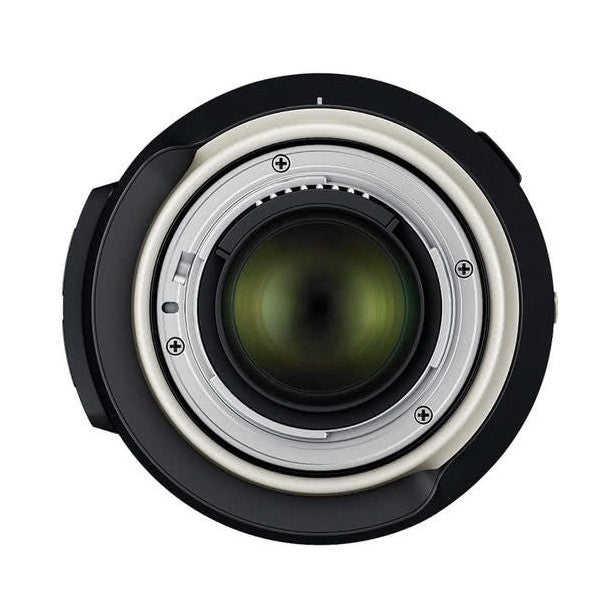 Rear view of Tamron 24-70mm f/2.8 G2 lens showing glass elements and metal mounting ring against white background.
