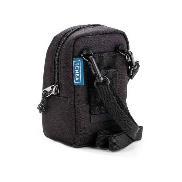Black camera pouch with Tenba label, shown at three-quarter angle displaying front pocket, zipper, and shoulder strap against white background.