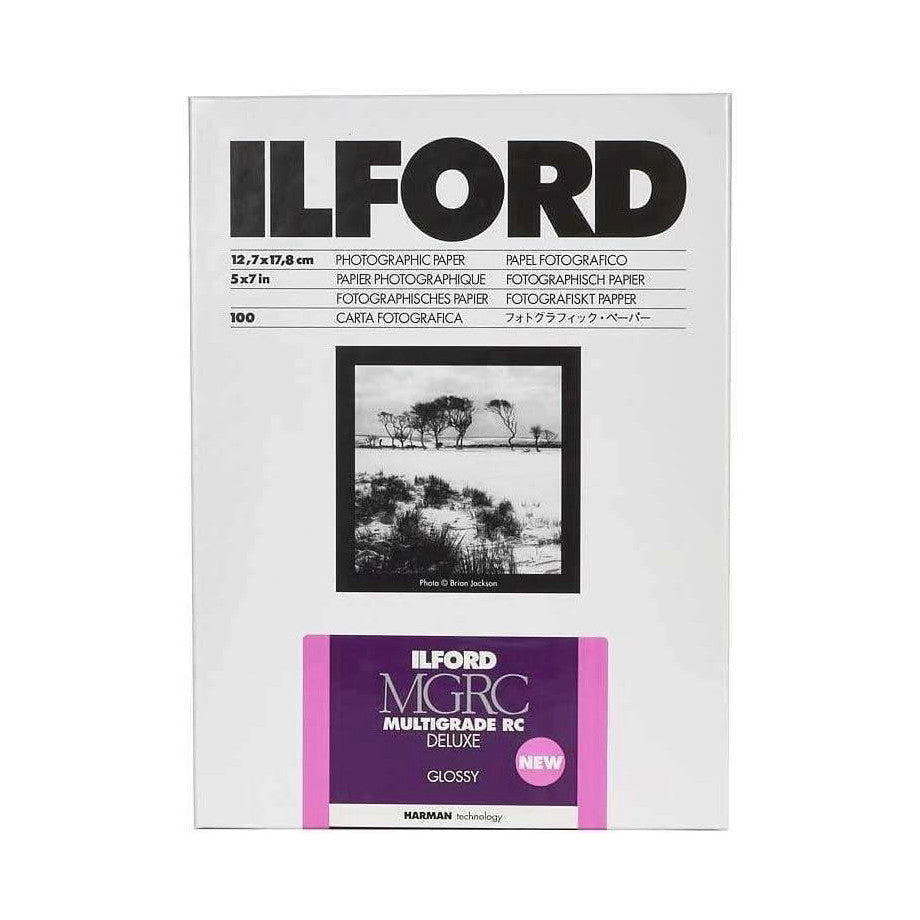 Package front showing ILFORD photographic paper box with black and white landscape photo sample and purple MGRC Multigrade RC Deluxe Glossy label.