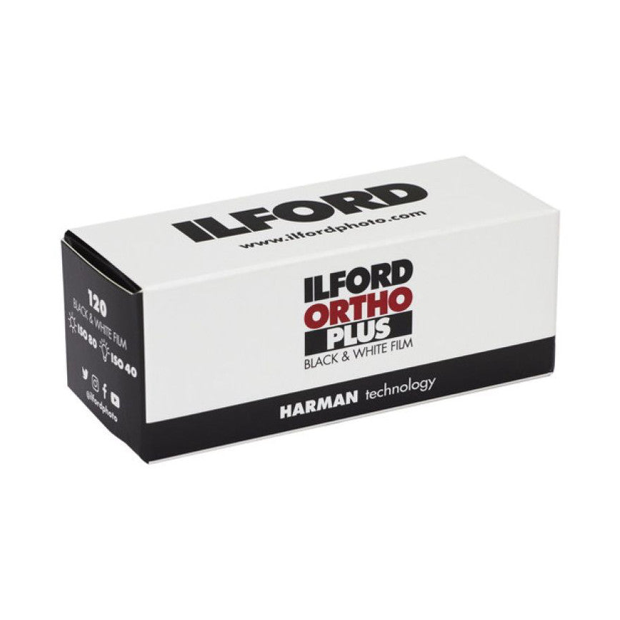 Ilford Ortho Plus 120 black and white film box displayed at an angle showing the front and top packaging with branding and specifications visible.