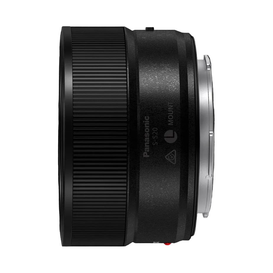 Side view of Panasonic Lumix S 20mm F2.5 lens showing textured black barrel and focus ring against black background.
