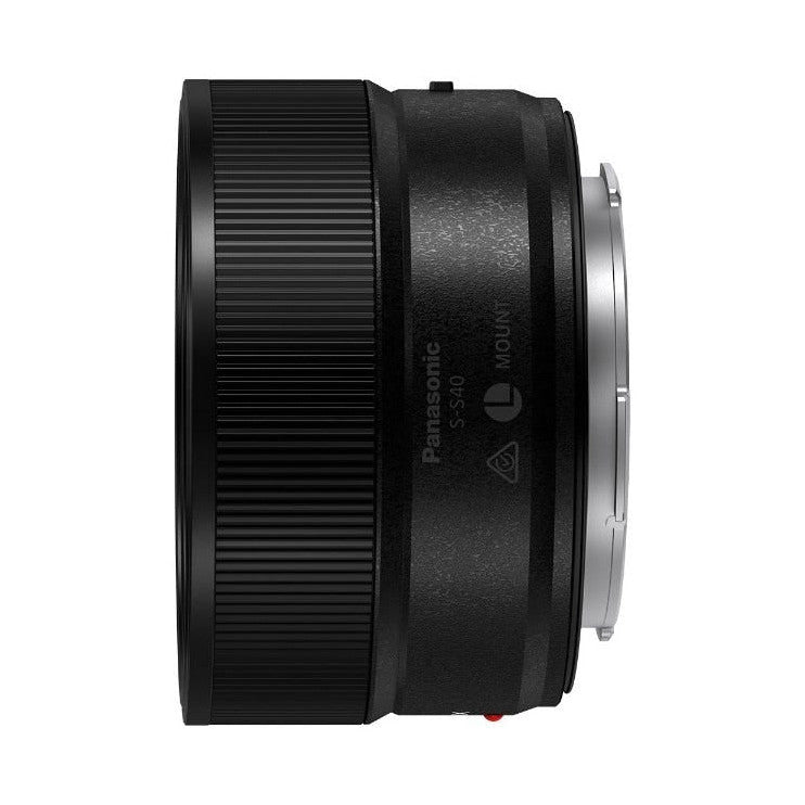 Side view of black Panasonic Lumix S 40mm F2 lens showing ribbed focus ring and barrel with branding details.