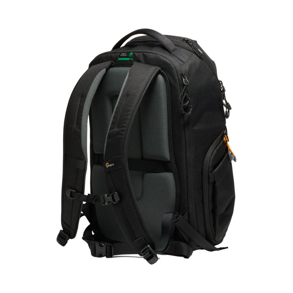 Rear view of black Lowepro backpack showing padded shoulder straps, gray mesh back panel, side pockets, and attached carabiners.