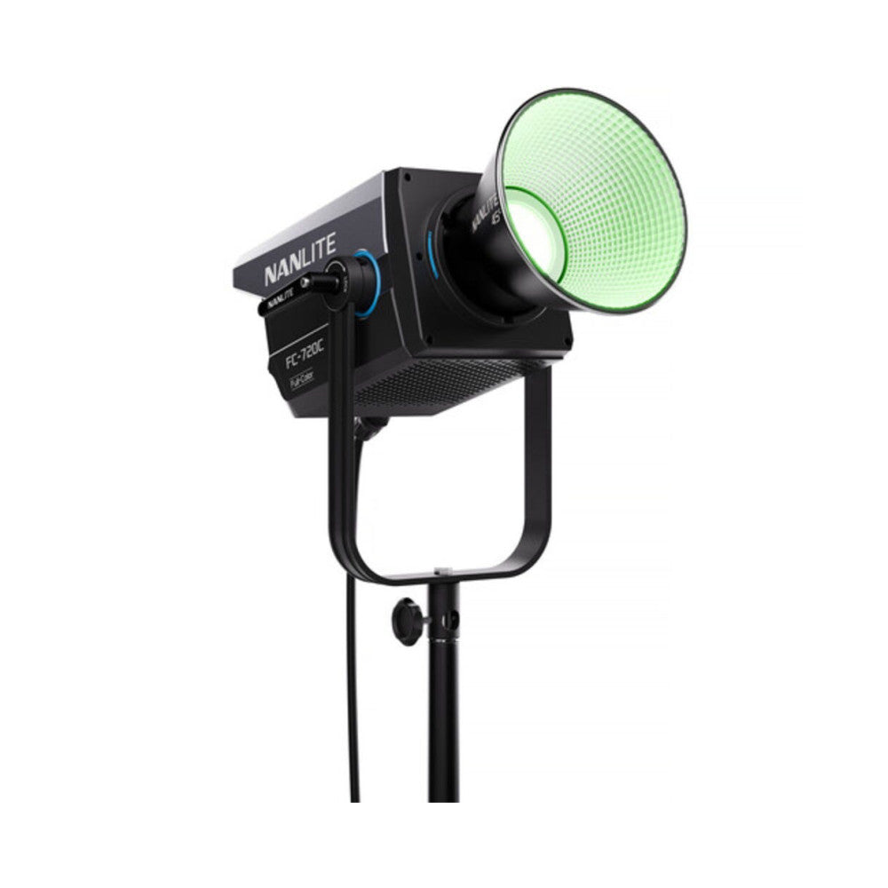 Black LED spotlight with green reflector mounted on adjustable stand, angled view showing front and side profile.