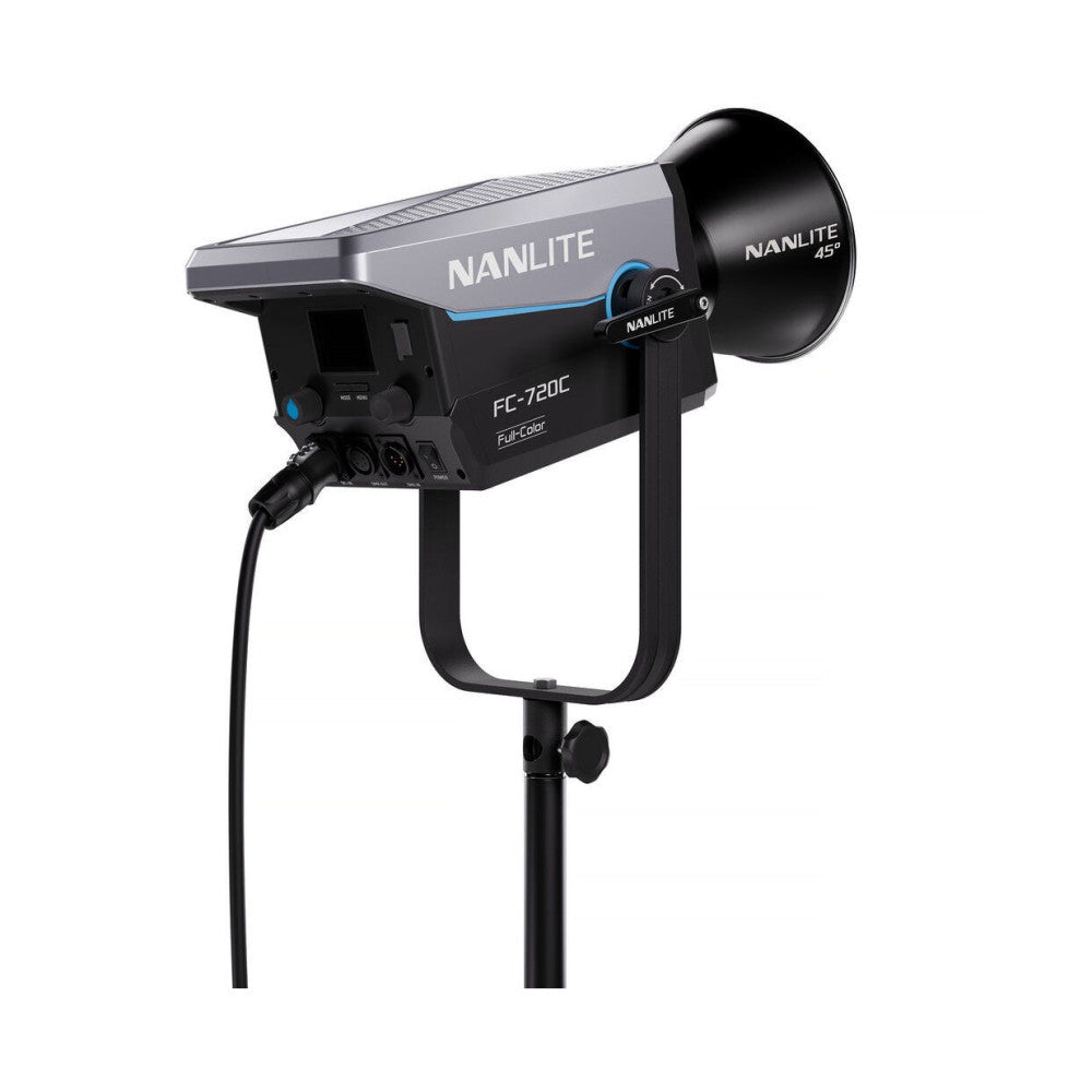 Nanlite FC-720C RGBW LED spotlight mounted on stand, showing front three-quarter view with reflector dish and control panel visible.