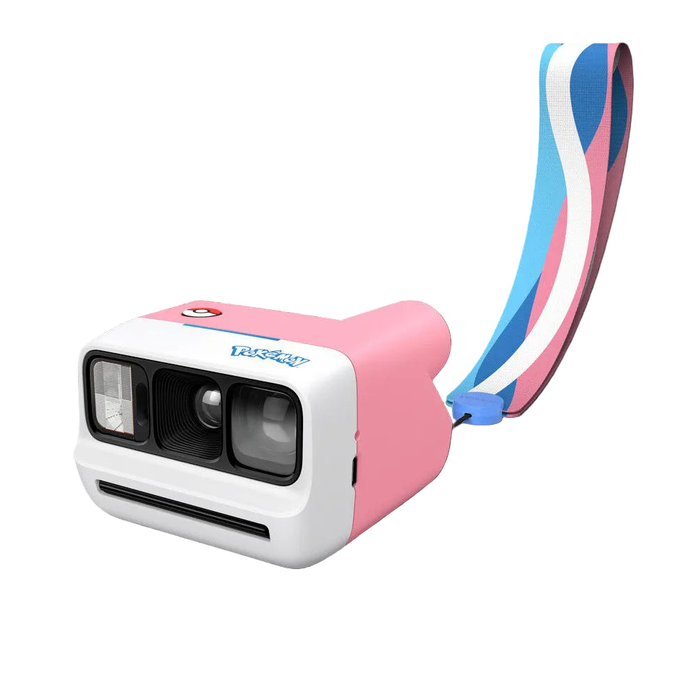 Pink and white Polaroid GO camera with blue and pink striped wrist strap attached, shown at three-quarter angle against black background.