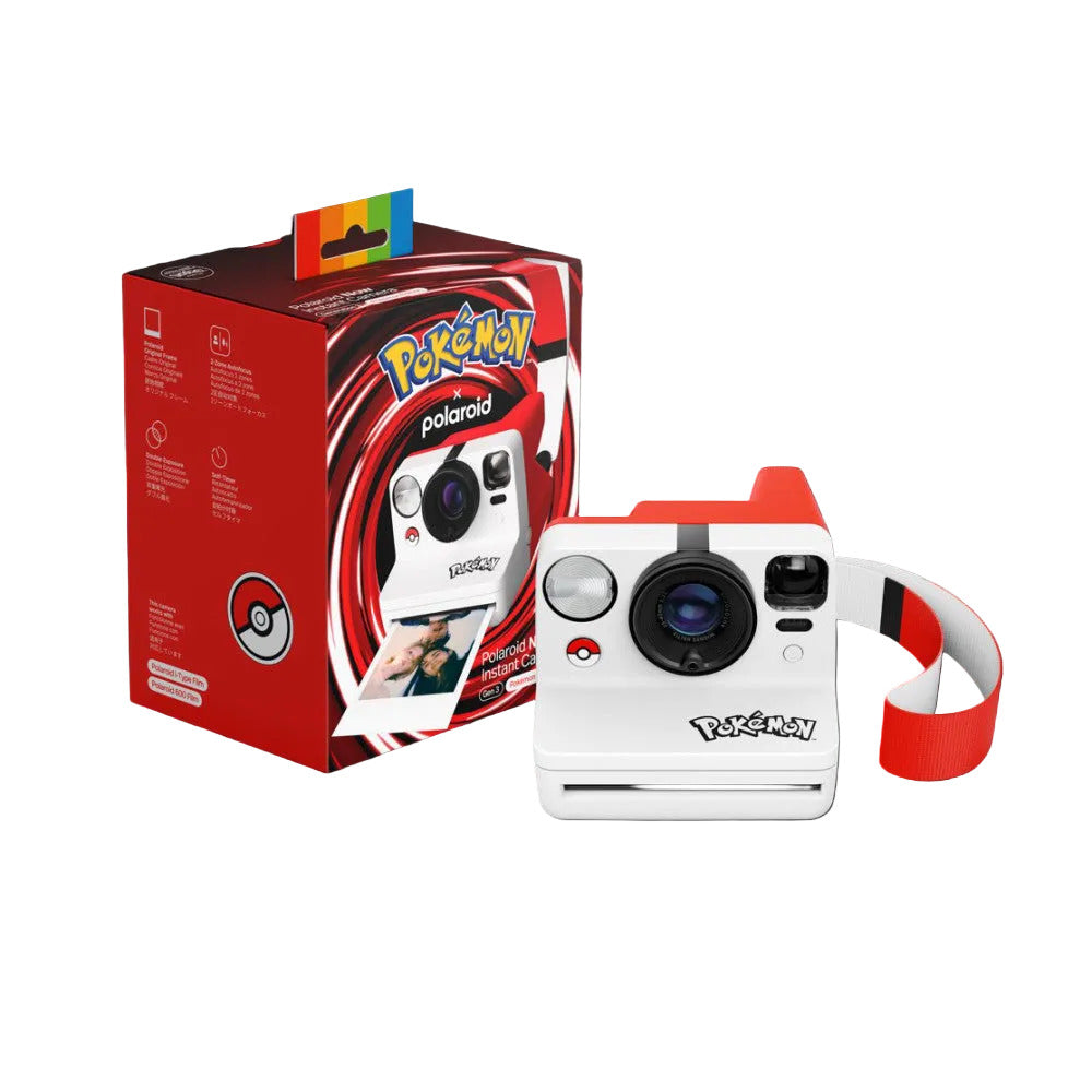 Pokémon x Polaroid instant camera with red box packaging, showing white camera with red accents and red shoulder strap against black background.