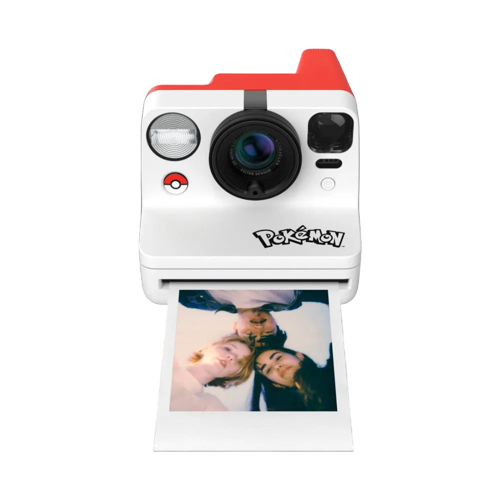 Polaroid 600 G3 Pokemon camera with red and white design shown from front view, dispensing an instant photo of three people below.