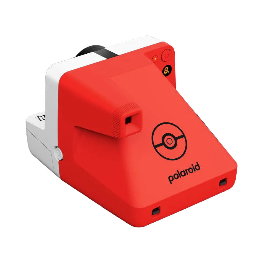 Red and white Polaroid 600 G3 instant camera shown from a three-quarter angle against a black background, displaying the front face with lens and branding.