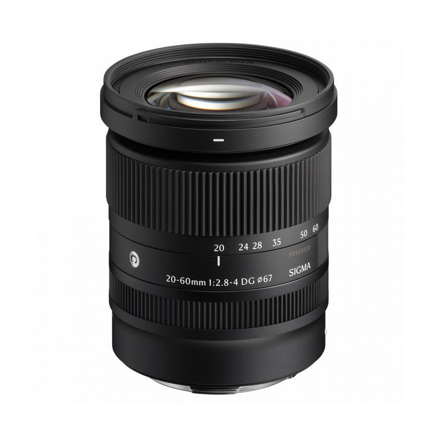 Black Sigma zoom lens shown from front angle, displaying focal length markings from 20-60mm and f/2.8-4 aperture on the barrel.