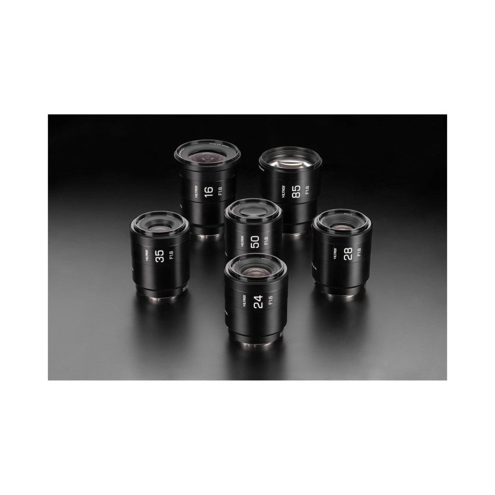Six black Viltrox RAZE AF lenses arranged in a circle on a reflective surface, displaying focal lengths 16mm, 24mm, 28mm, 35mm, 50mm, and 85mm F1.8.