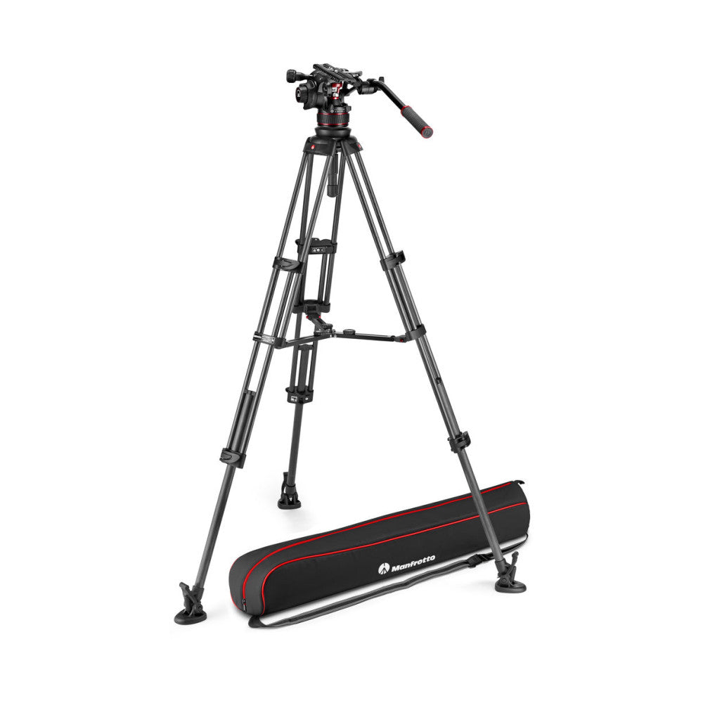 Professional video tripod with fluid head and microphone boom arm, displayed from front angle with carrying bag below, isolated on white background.