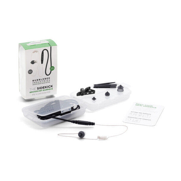 Product packaging and contents displayed, showing earpiece with curly cable, various ear tips, storage case, and instruction manual on white background.