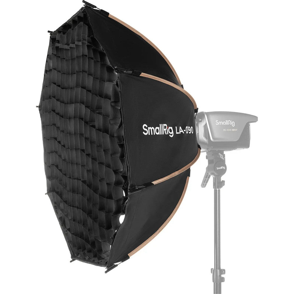 SmallRig LA-090 softbox with grid mounted on light stand, shown from front angle displaying fabric surface and internal grid structure.
