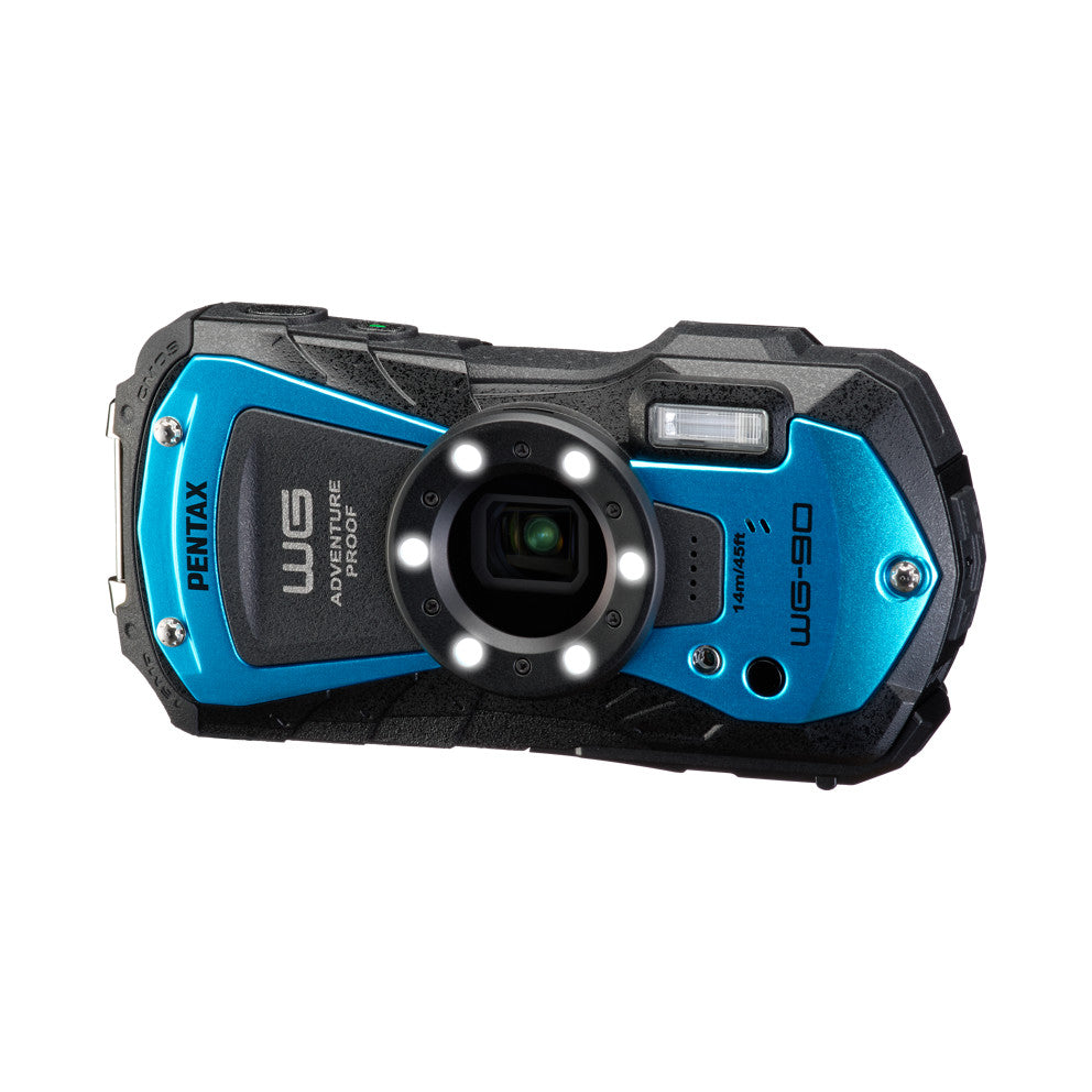 Front view of blue and black Pentax WG-90 rugged digital camera with LED flash ring around lens and adventure proof branding visible.