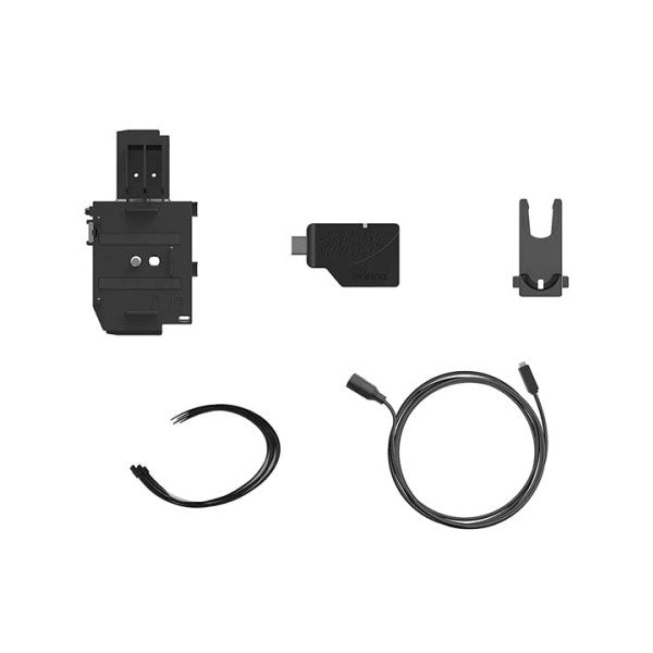 Five black components of the BRINNO AFB1000 camera extender kit laid out flat: mounting bracket, adapter, clip, and two cables on white background.
