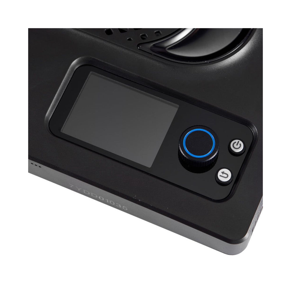 Close-up of Amaran Pano 120C control panel showing LCD screen, blue dial, and power button on black housing.
