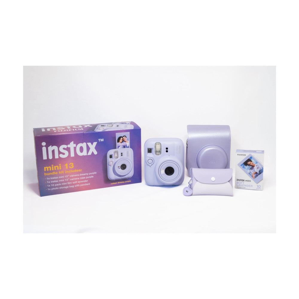 Instax Mini 13 bundle contents displayed: purple box, two cameras, carrying case, film pack, and storage bag against white background.
