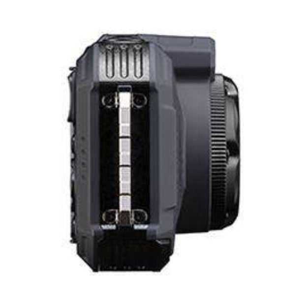 Side view of a rugged grey and black digital camera showing its compact body with vertical grip design and control buttons.