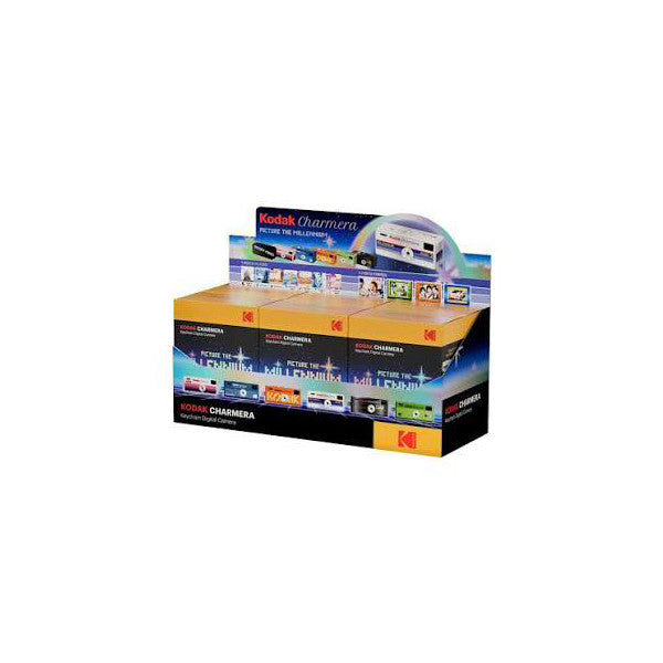 Retail display box for Kodak Charmera camera keychains showing stacked packaging with product images and Kodak branding on front and sides.