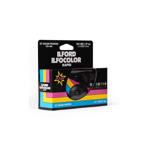 Packaging for Ilford Ilfocolor Rapid Retro single-use camera shown at three-quarter angle, displaying colorful retro-themed box design with camera image and product details.