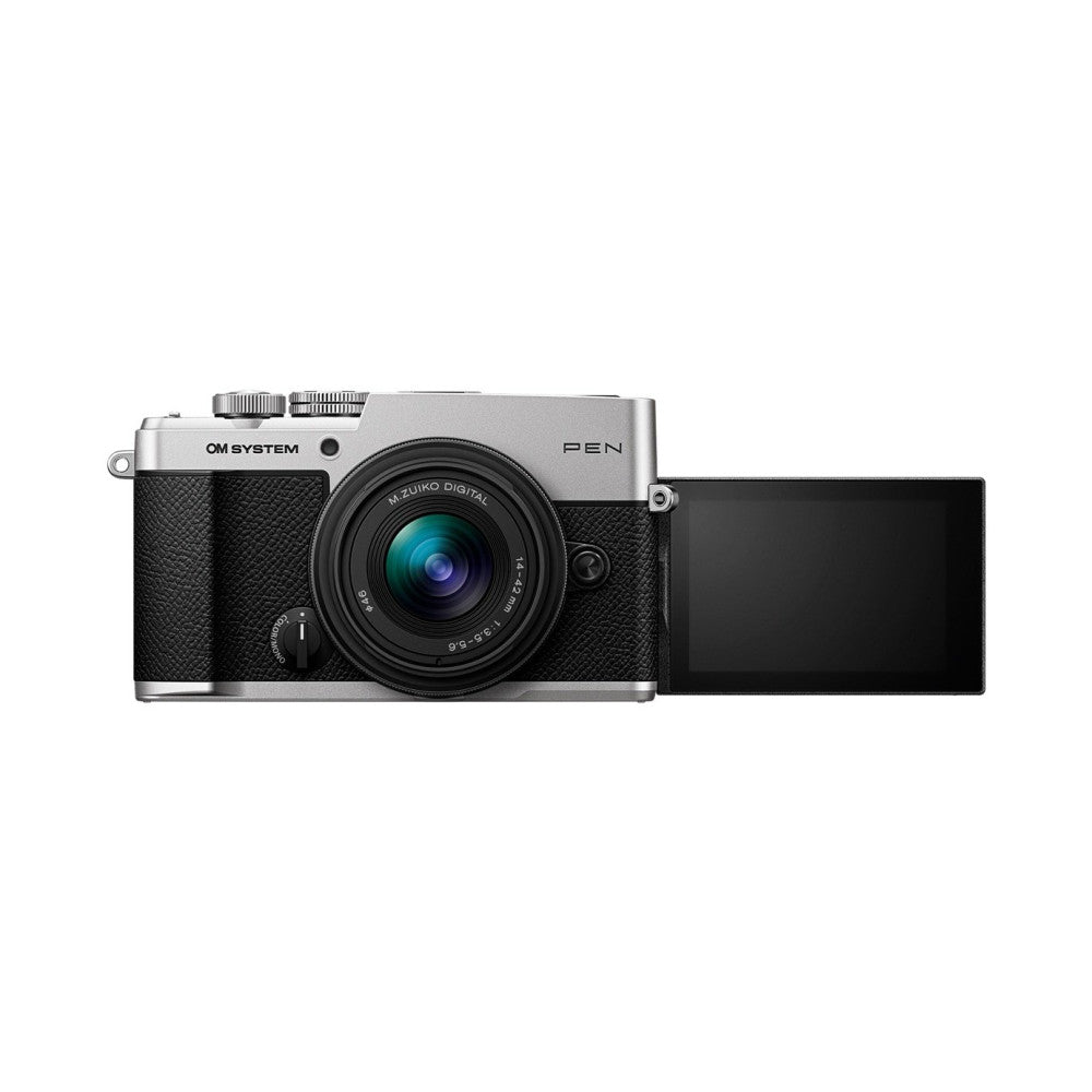 Silver OM System PEN camera with black textured grip and attached M.Zuiko 14-42mm lens, shown from front-left angle with articulating screen extended to the right.