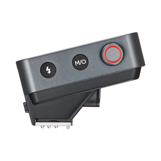 Top view of Godox X3 PRO wireless flash trigger showing three control buttons: lightning bolt, power button, and red record button on dark gray surface.