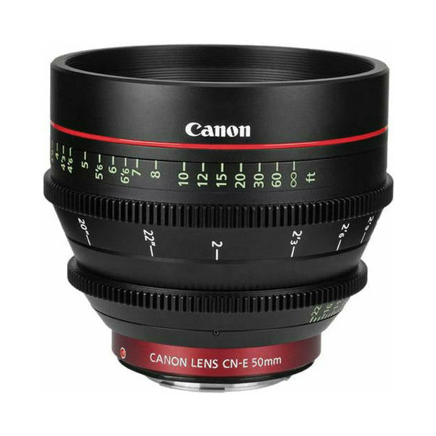Front view of Canon CN-E 50mm cinema lens showing focus ring, aperture markings, and red Canon branding on barrel.