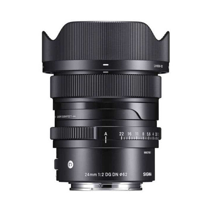 Front view of Sigma 24mm F2 DG DN lens showing barrel, focus ring, aperture scale, and lens hood against white background.