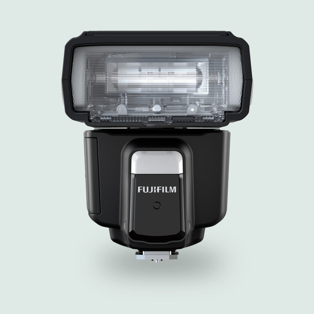 Front view of black Fujifilm EF60 flash unit against white background, showing flash head and body with branding.