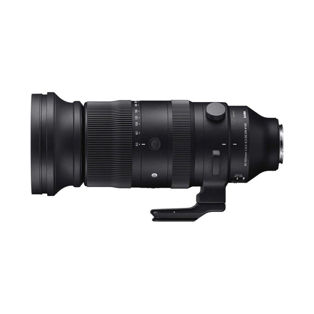 Side view of a black Sigma telephoto lens with ribbed focusing ring and zoom barrel against a white background.