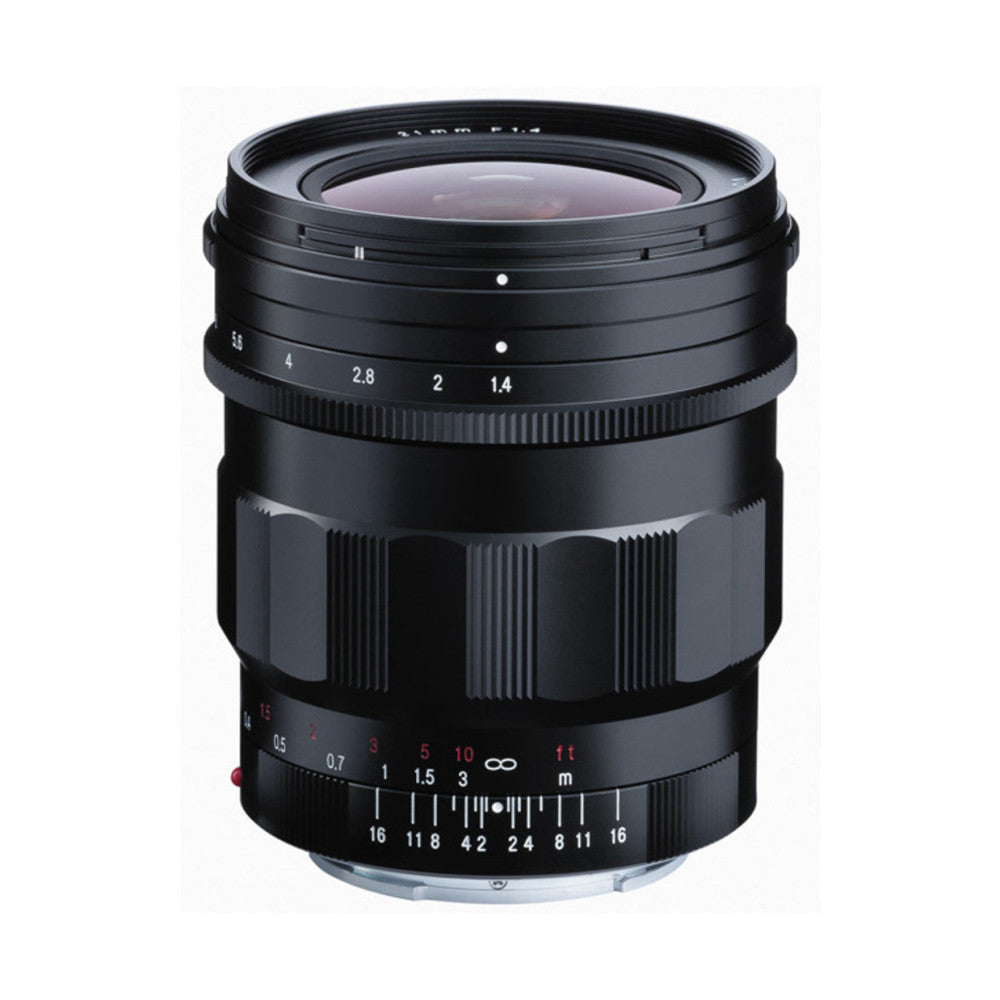 Black Voigtlander Nokton 21mm f/1.4 lens shown from front angle, displaying aperture ring, focus ring with distance markings, and glass front element.