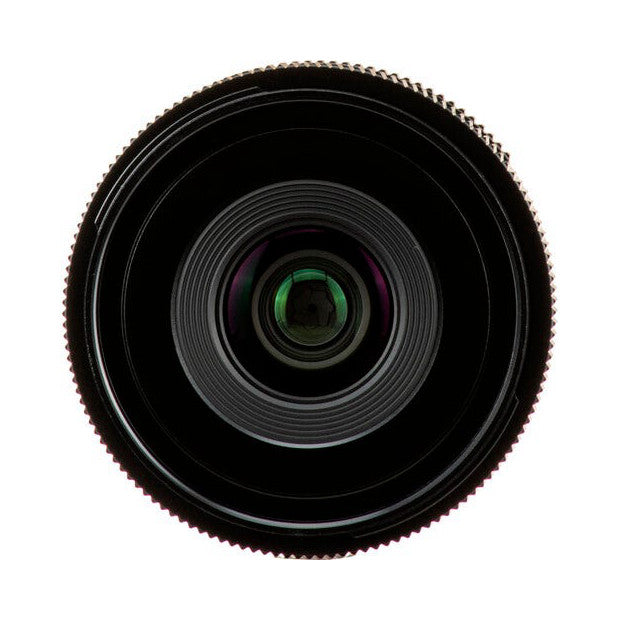 Front-facing view of a wide-angle lens showing the glass elements and green-tinted rear lens group against black housing.