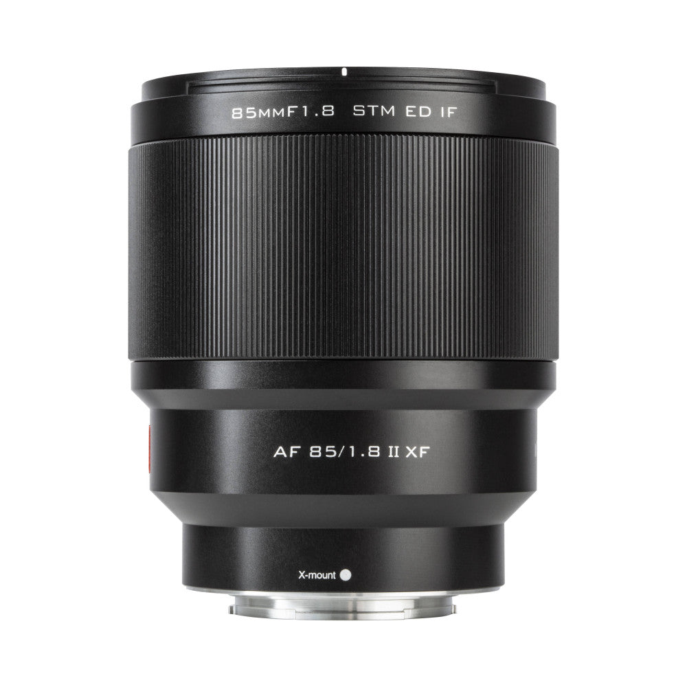 Front view of black telephoto lens showing barrel with vertical ribbing, labeled specs, and X-mount connector at base.