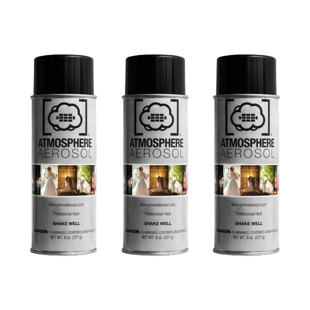 Three black aerosol cans with Atmosphere Aerosol branding and product images displayed front-facing against white background.