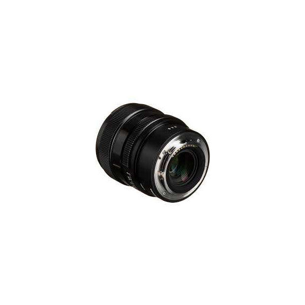 Black Sigma 20mm f/2 lens shown from rear three-quarter angle displaying the mount, glass elements, and focus ring against white background.