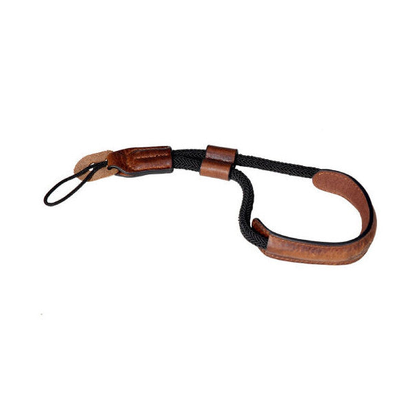 Brown leather and black fabric wrist strap with metal connectors, displayed flat against white background showing full length and loop design.