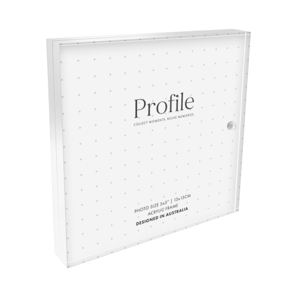 White acrylic photo frame with polka dot pattern, displayed at an angled three-quarter view showing the front and side edges.