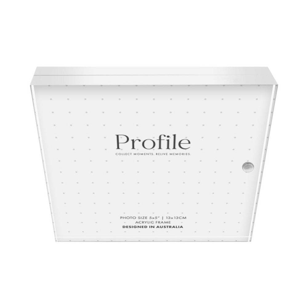 Front view of a clear acrylic picture frame with white dotted pattern and Profile branding, displayed at an angle against a white background.