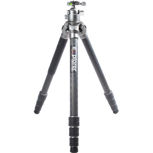 Full-length front view of black carbon fiber tripod with extended legs, ball head mount, and textured grip sections against white background.